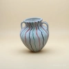 White double-ear ceramic sealed jar with red, black and green wavy patterns, ceramic glass set Specification image